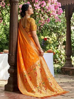 Yellow soft silk blend woven partywear saree 3