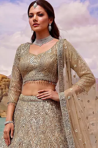 Luxurious Gold Sequins Net Reception Wear Lehenga Choli With Dupatta