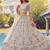 Charming Cream Embroidered Net Engagement Wear Lehenga Choli