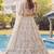 Charming Cream Embroidered Net Engagement Wear Lehenga Choli