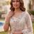 Charming Cream Embroidered Net Engagement Wear Lehenga Choli
