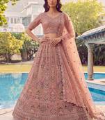 Glowing Peach Embroidered Net Wedding Wear Lehenga Choli with Dupatta