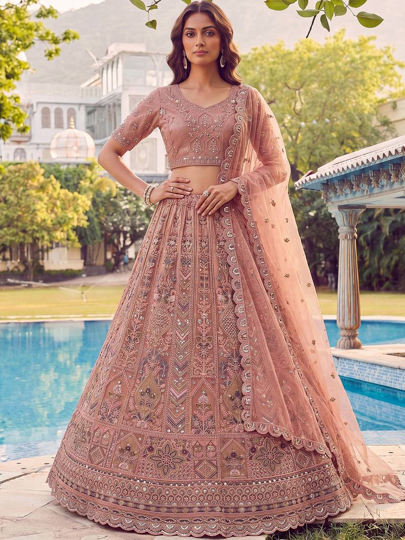 Glowing Peach Embroidered Net Wedding Wear Lehenga Choli with Dupatta