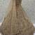 Shiny Beige Embroidered Net Reception Wear Lehenga Choli With Dupatta