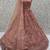 Glowing Peach Embroidered Net Wedding Wear Lehenga Choli with Dupatta