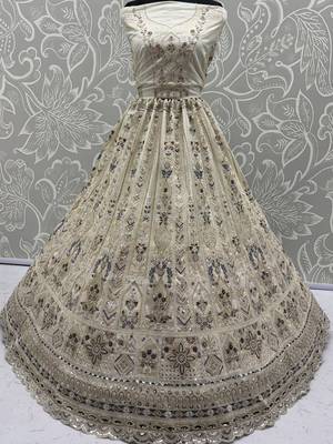 Charming Cream Embroidered Net Engagement Wear Lehenga Choli 7