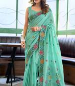 Turquoise linen jacquard woven saree with blouse