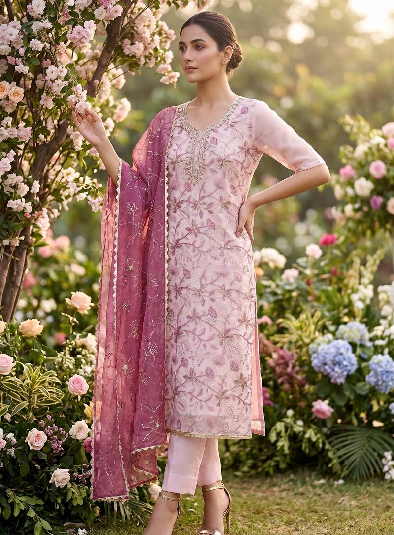 rani pink organza handwork salwar suit with organza dupatta