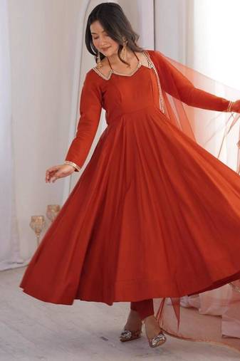 Rust color roman silk chanderi solid -mirror lace work anarkali set full stitched.