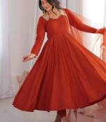 Rust color roman silk chanderi solid -mirror lace work anarkali set full stitched.
