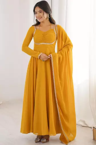 Yellow color faux georgette flared gown dupatta full stitched.