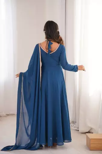 Blue color faux georgette flared gown dupatta full stitched.