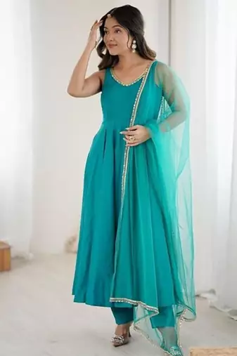 Rama color roman silk chanderi solid -mirror lace work anarkali set full stitched.