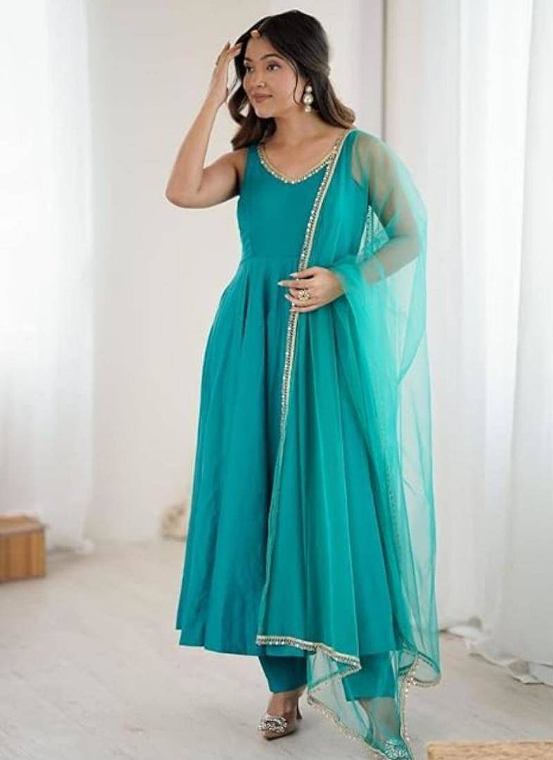 Rama color roman silk chanderi solid -mirror lace work anarkali set full stitched.