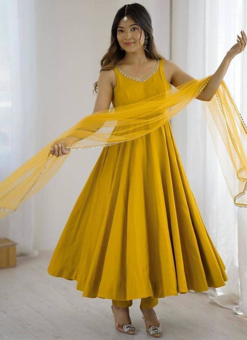 Yellow color roman silk chanderi solid -mirror lace work anarkali set full stitched.