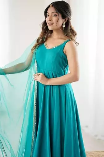 Rama color roman silk chanderi solid -mirror lace work anarkali set full stitched.