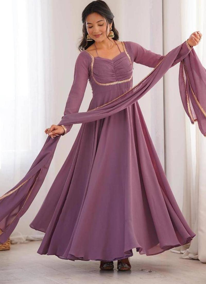 Mouvpink color faux georgette flared gown dupatta full stitched.