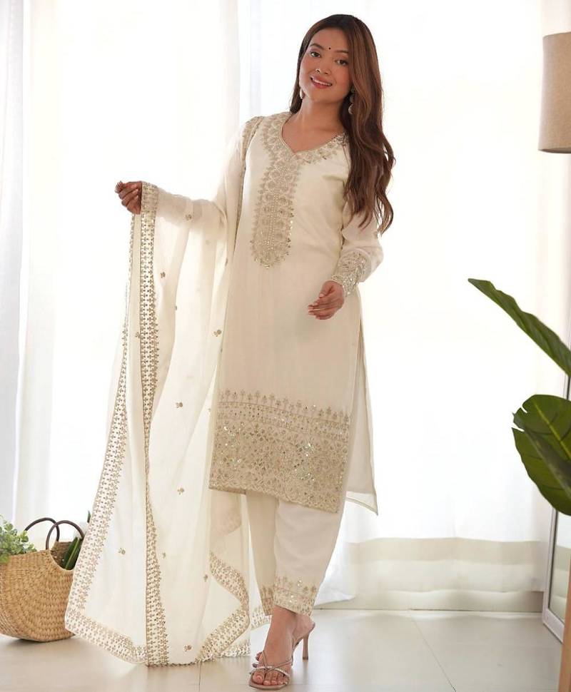 White color chinnon silk zari sequeince embroidered anarkali set full stitched.