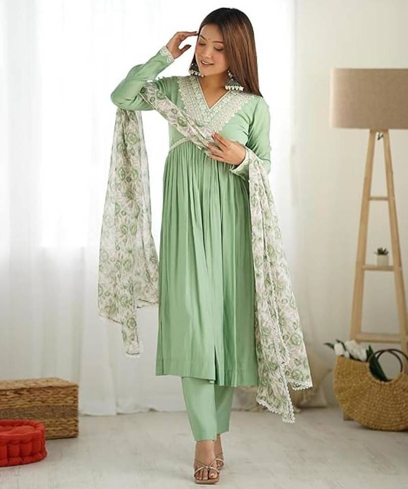 Pista color roman silk chanderi nyra cut thread dori sequence work kurta set full stitched.