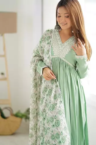 Pista color roman silk chanderi nyra cut thread dori sequence work kurta set full stitched.
