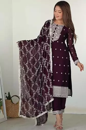 Wine color rangoli silk thread sequince embroidered work anarkali set full stitched.