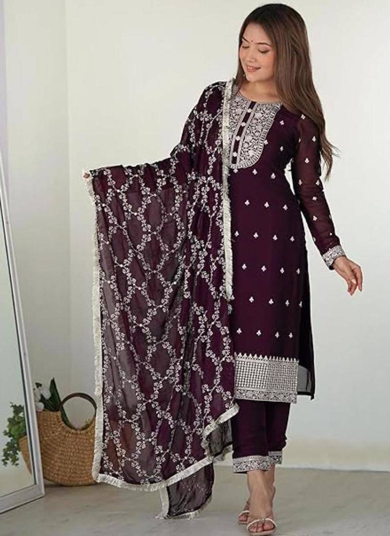 Wine color rangoli silk thread sequince embroidered work anarkali set full stitched.