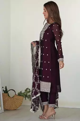 Wine color rangoli silk thread sequince embroidered work anarkali set full stitched.