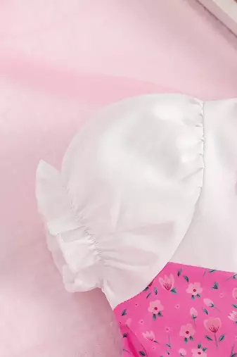 Pink floral print puff sleeve fit & flare girls dress with heart sling bag