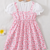 Peach floral print puff sleeve fit & flare girls dress with heart sling bag