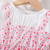 Peach floral print puff sleeve fit & flare girls dress with heart sling bag