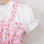 Peach floral print puff sleeve fit & flare girls dress with heart sling bag