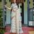 beige colour Ready to wear saree with unstitched blouse