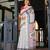 off white color Ready to wear saree with unstitched blouse