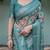 teal green colour Ready to wear saree with unstitched blouse