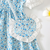 Blue floral print puff sleeve fit & flare girls dress with heart sling bag