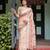 beige colour Ready to wear saree with unstitched blouse