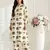 Women new trendy  off-white & mustard yellow elephant print cotton kurta with palazzos