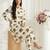 Women new trendy  off-white & mustard yellow elephant print cotton kurta with palazzos