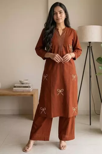 Women new trendy  rust orange embroidered cotton kurta with palazzos