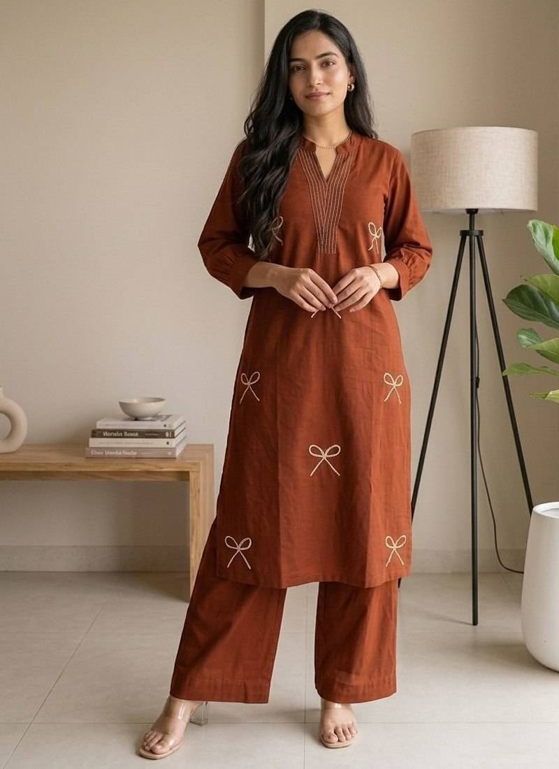 Women new trendy  rust orange embroidered cotton kurta with palazzos