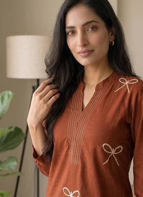 Women rust orange embroidered cotton kurta with palazzos 2