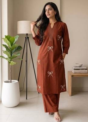 Women rust orange embroidered cotton kurta with palazzos 3