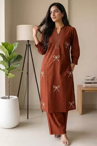 Women new trendy rust orange embroidered cotton kurta with palazzos