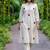 New latest women off-white embroidered cotton a-line kurta with trousers