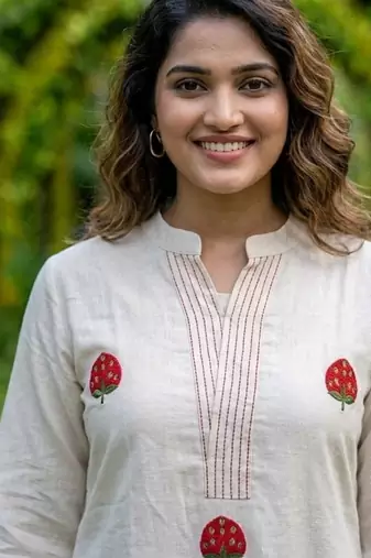 New latest women off-white embroidered cotton a-line kurta with trousers