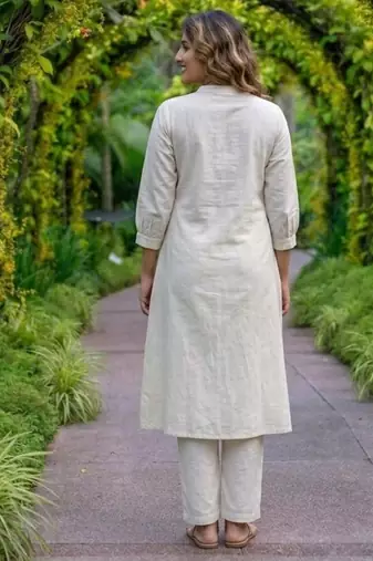 New latest women off-white embroidered cotton a-line kurta with trousers