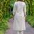 New latest women off-white embroidered cotton a-line kurta with trousers