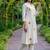 New latest women off-white embroidered cotton a-line kurta with trousers