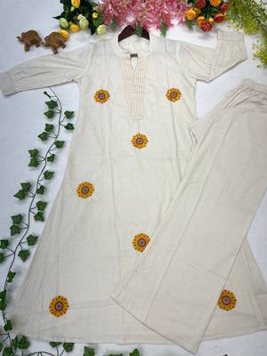  women off-white embroidered cotton a-line kurta with trousers 4
