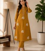 Women mustard cotton printed kurta with trousers co-ord set
